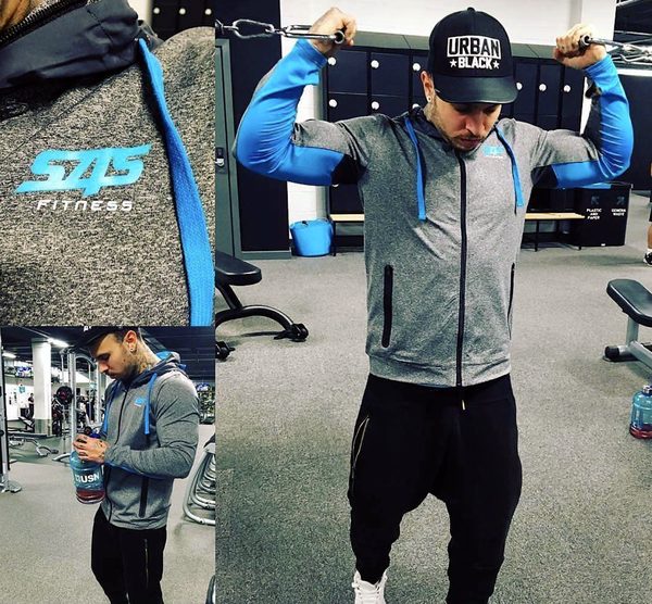@lambros_fitness: Arm day in the hoodie